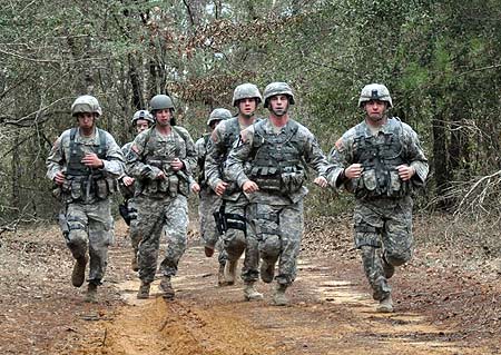 FORT BENNING, Ga. -- Soldiers compete in the two-mile run portion of the pistol assault team match Feb. 22 at the 2010 All-Army Small Arms Championships. While cadets from the U.S. Military Academy won the pistol assault team match, Army Reservists of the 2nd Battalion, Small Arms Readiness Group, Camp Bullis, Texas won the overall team championship.  (Photo by Michael Molinaro, USAMU PAO)