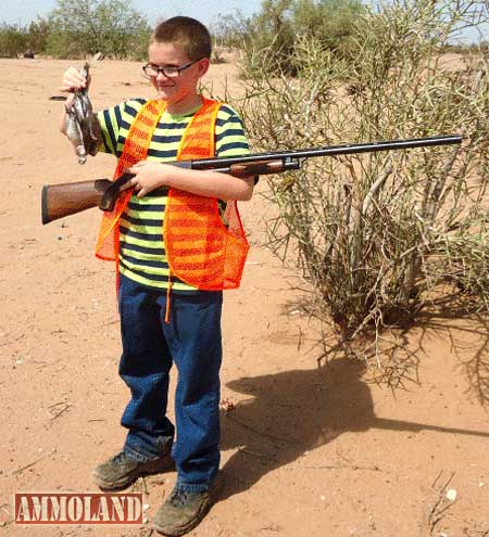 Proud youngster Cameron with his first doves. He is hooked!