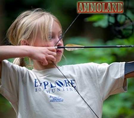 Young Girl Takes Aim With Bow