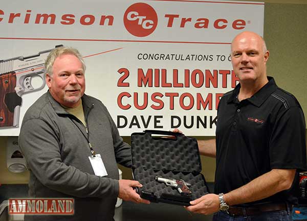 Crimson Trace 2-millionth Customer Dave Dunker with CEO Lane Tobiassen