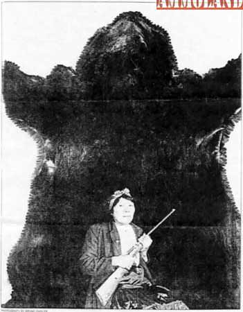 Bella Twin is shown with the hide from the world record grizzly bear