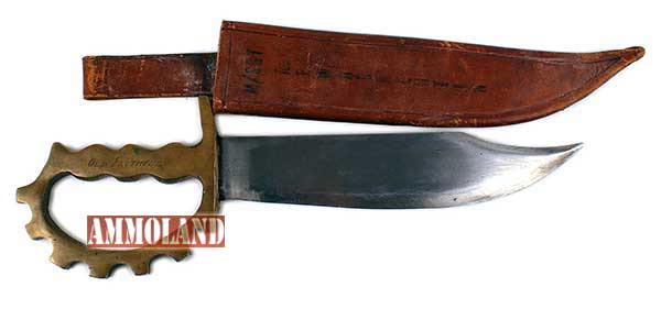 U.S. World War II 1st Ranger Battalion special combat knife with a 9 ¼ inch Bowie blade (MB: $1,000).