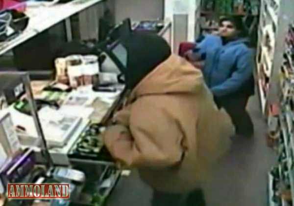 Female Clerk Takes Robber’s Gun