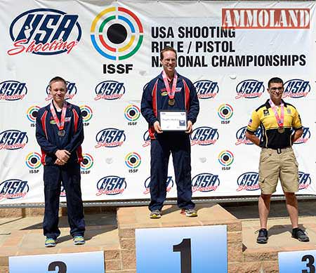 FORT BENNING, GA - Pfc. Dan Lowe stands atop the podium after taking third place in Men’s 10 Meter Rifle during the 2015 USA Shooting Rifle and Pistol National Championship.