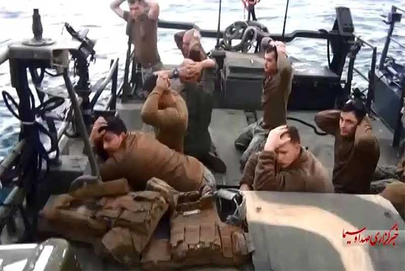 American military personnel on their boat after they were captured by the Iranian Revolutionary Guard Corps. img Iran Navy