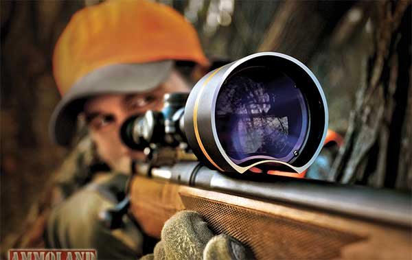 Man looking in the rifle scope | Long Range Shooting Tips For Beginners