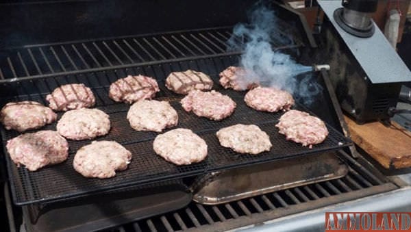 patties and smoke chief on grill