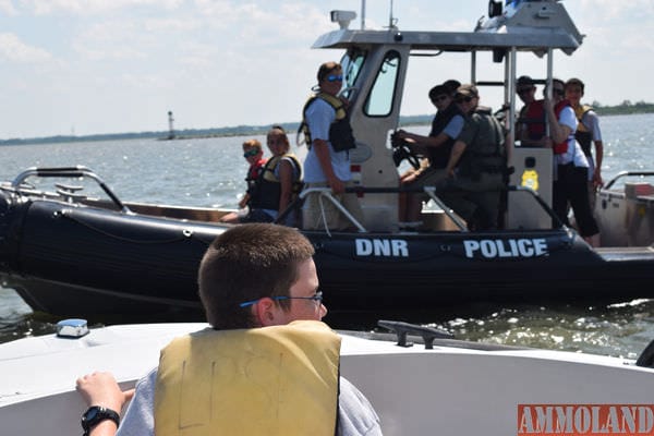 Fish & Wildlife Natural Resource Police Youth Academy students conduct a vessel boarding during training