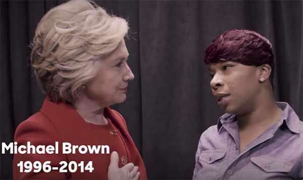 HIllary Clinton poses for photo's with thug Michael Brown's mother Leslie McSpadden of "Hand Up Don't Shoot" fame.