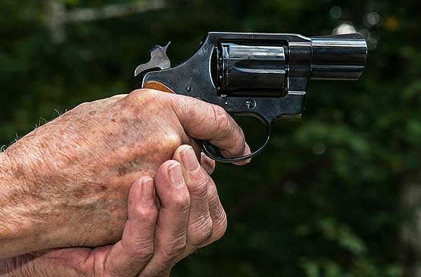 Elderly Old Man Hands Revolver