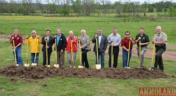 (L to R): Cherokee Nation Director of Planning and Development David Moore, Executive Director of Management Resources Bruce Davis, Secretary of State Chuck Hoskin Jr., Deputy Principal Chief S. Joe Crittenden, World Archery Champion Joe Thornton, Principal Chief Bill John Baker, Tribal Councilor Rex Jordan, Deputy Executive Director of Education Services Ron Etheridge, archery program coordinator Brian Jackson, Oklahoma Department of Wildlife Education Supervisor Colin Berg and Cherokee County Game Warden Brady May.