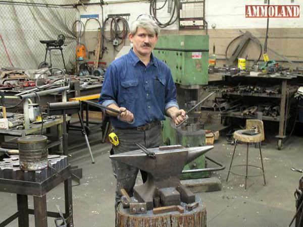 Milwaukee Master Blacksmith Mr. Schweizer with recently sharpened Milwaukee Nail & Waukesha Spike.