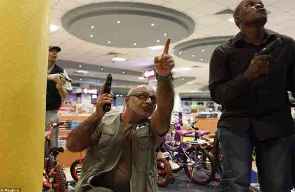 Armed citizens were the First-Responders during the 2013 attack at Westgate Mall in Nairobi, Kenya. The man pointing is wearing a patch for the sport shooting organization.