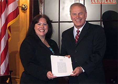 Linda Walker and former Governor Strickland at the Ohio castle doctrine bill signing.