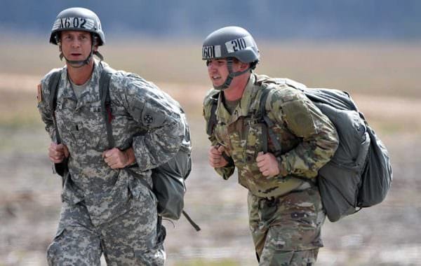 Army 1st Lt. Nicholas T. Krantz, commander of the Army Reserve’s 811th Ordnance Company, 321st Ordnance Battalion, 38th Regional Support Group, 310th Sustainment Command (Expeditionary), headquartered in Rainelle, W. Va., left, conducts airborne operations training at Fryar Drop Zone, Fort Benning, Ga., Feb. 20, 2017. Army photo by Capt. Sean Delpech