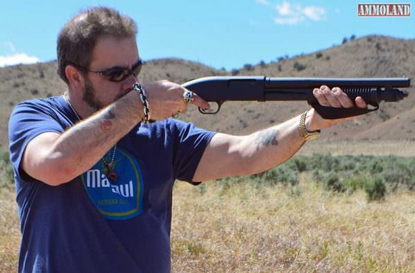 Mossberg 590 Shockwave with your hand securely in the loop