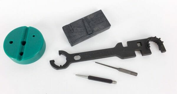 For an "assembly" like this, you'll want a couple of custom rifle builder tools like these that will help you out when you build your own Ar-15 rifle.