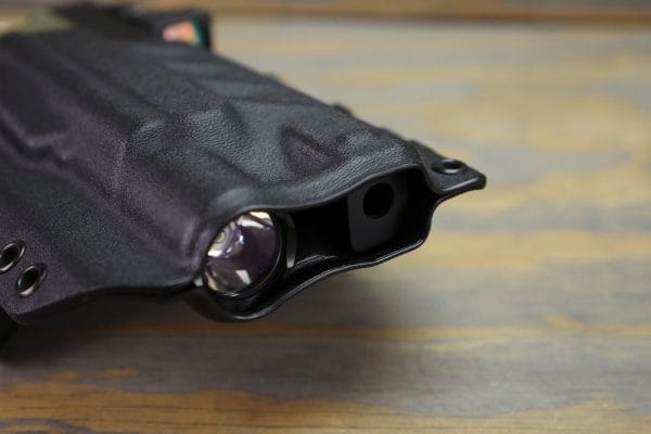 The Roland Special holster is molded to accept a Surefire X300U-A and a compensator as called for in the build sheet. The edges are nicely rolled and finished to feel like the two halves on the holster are one piece that has been split open to accept a gun.