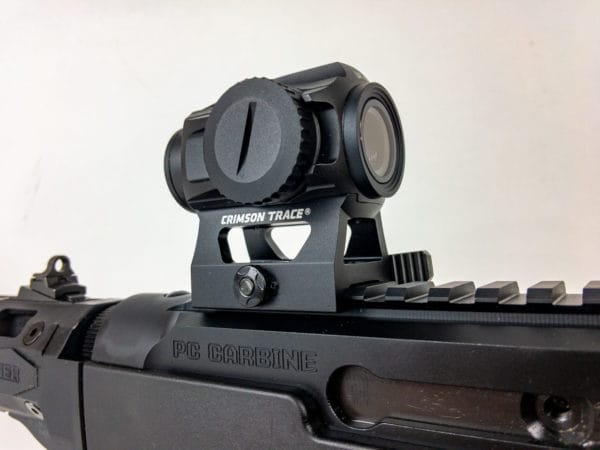 Sighting options are as good as those on rifle caliber firearms and usually better than on most pistol. In this case, the Crimson Trace CTS-1000 red dot co-witnesses perfectly with the iron aperture sights - just look right through the sight mount base.