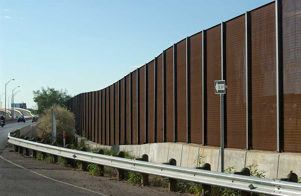 Border Fence along Highway 85; iStock-182883054