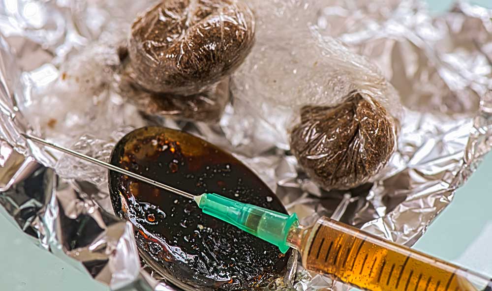 Heroin Drugs Cocaine Spoon Bag iStock-Stephen Barnes-963834972.jpg