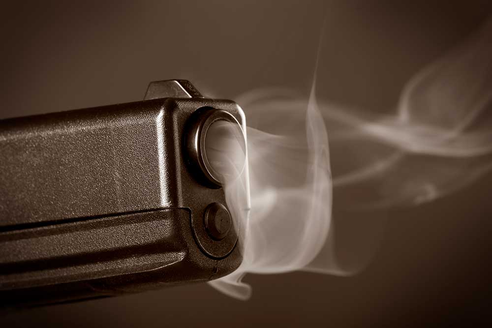 Smoking Gun Barrel Glock iStock-apastron-179258263