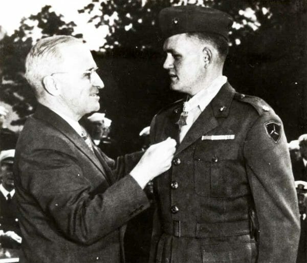 President Harry S. Truman awards the Medal of Honor to Marine Corps Maj. Louis H. Wilson Jr.