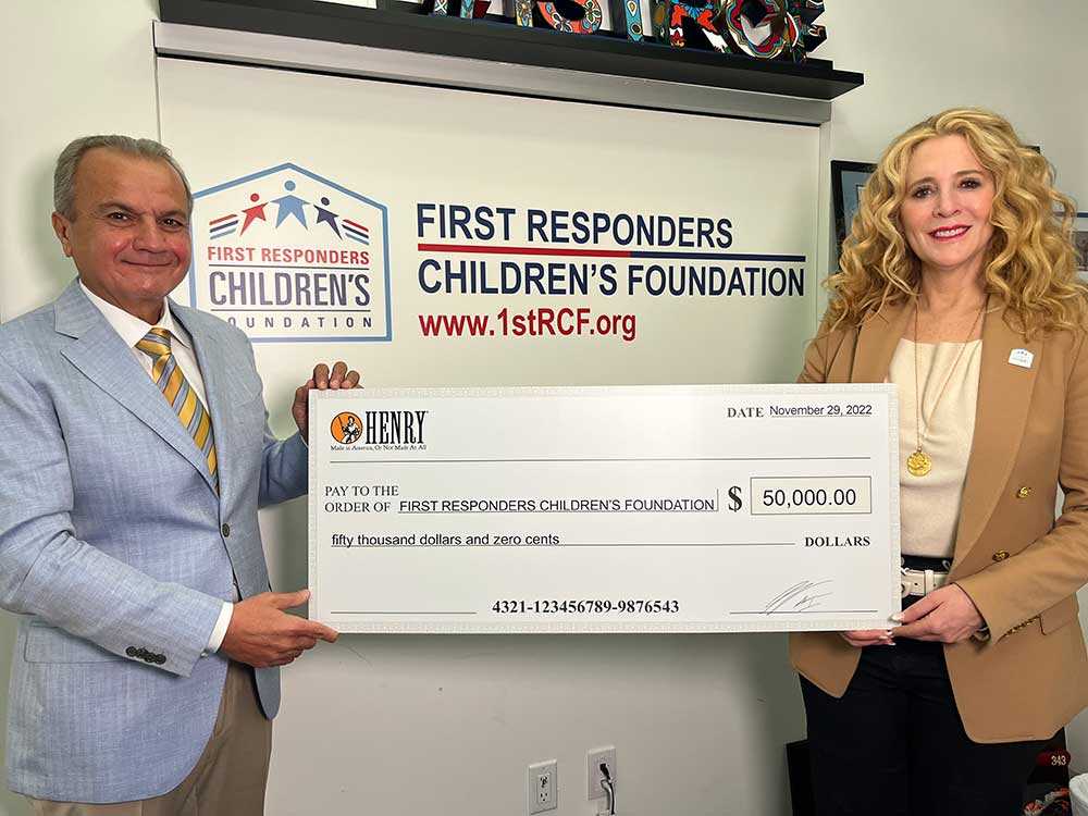 Henry Repeating Arms CEO & Founder Anthony Imperato (L) presenting a $50,000 donation to First Responders Childrenâ€™s Foundation President & CEO Jillian Crane (R) at the organizationâ€™s headquarters in New York City.Responders Childrenâ€™s Foundation President & CEO Jillian Crane (R) at the organizationâ€™s headquarters in New York City.