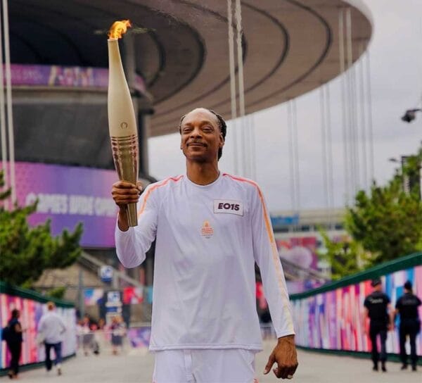 So soon after we've seen the fruits of media amplified hate advocacy result in an assassination attempt against Donald Trump, this is who special interests have decided should represent the United States by carrying an Olympic torch? (Make America Crip Again/Wikipedia Archive)