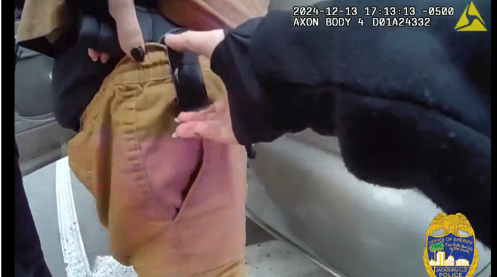 Jacksonville Sheriff’s Office footage of the Dec. 13 shooting, during which Officer Mindy Cardwell shot motorist Jason Arrington in his leg with his own pistol. Cardwell has since been fired for conduct the agency found was “grossly incompetent.” (Photo Jacksonville Sheriff’s Office).