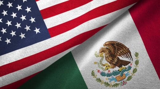 Mexico vs United States two flags iStock-Oleksii Liskonih 1089424824